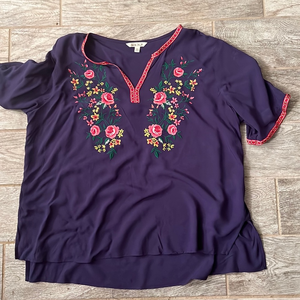 Blouse runs a little small
